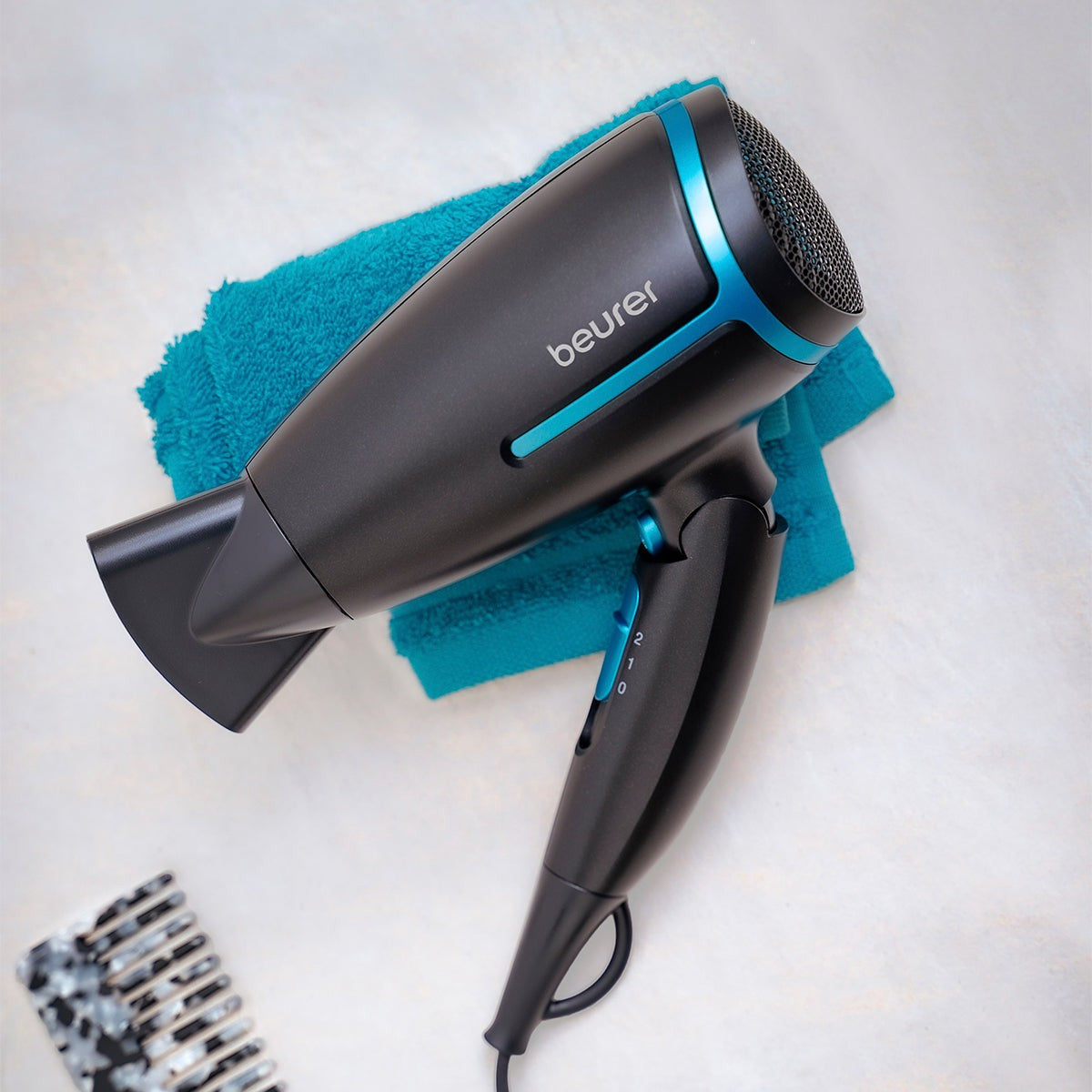 Secadora de viaje para cabello con mango plegable ergonómico 2 niveles de velocidad / HC25BF23 Beurer