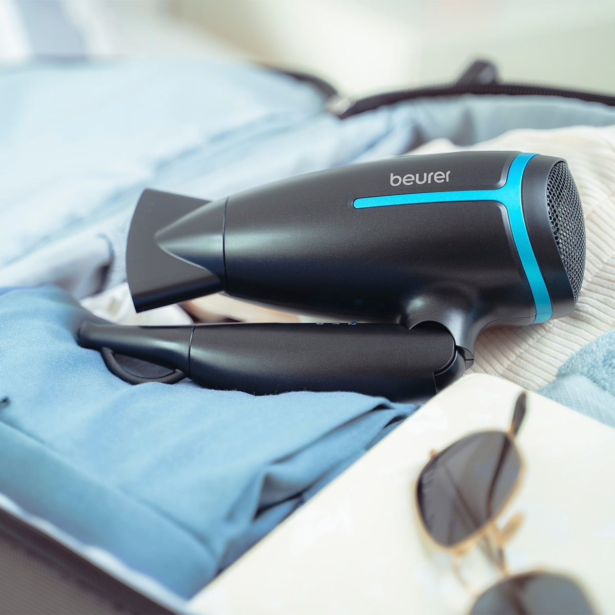 Secadora de viaje para cabello con mango plegable ergonómico 2 niveles de velocidad / HC25BF23 Beurer